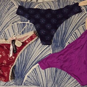 Victoria's Secret Red/Cream, Solid Purple, Purple w/flowers Thongs
